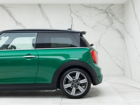 Presented in British Racing Green with Black Bonnet Stripes, this 2021, Mini Coopers