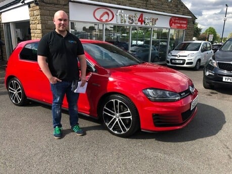 Golf GTD in metallic red