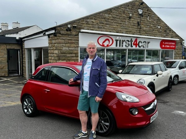 Kelvin collecting his daughters new car