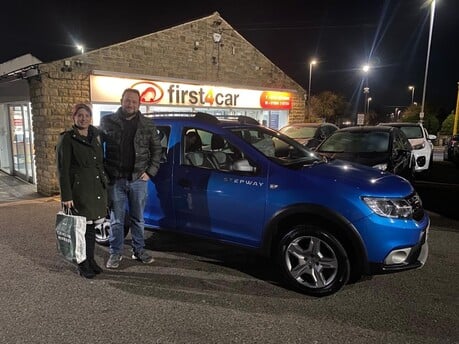 Rebekah collecting her lovely new Dacia