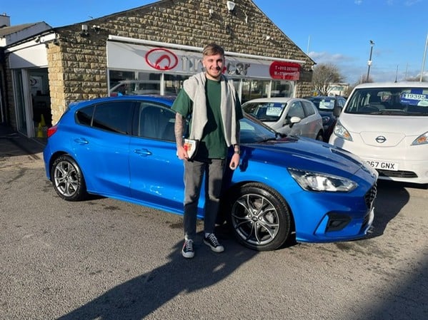 Oliver picking up his new car