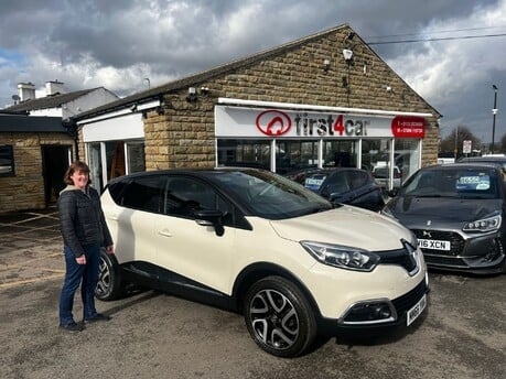 Karen collecting her new car