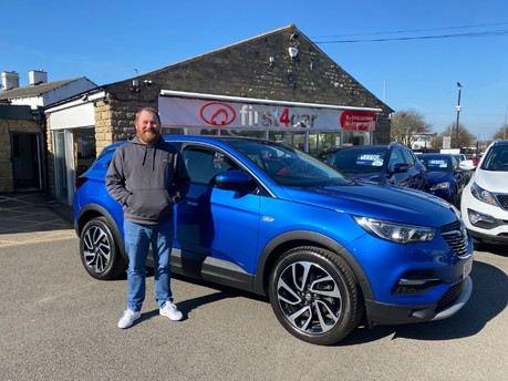 Ian collecting his new car