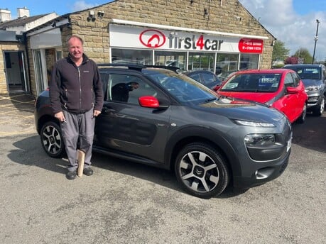 Colin collecting his new car 