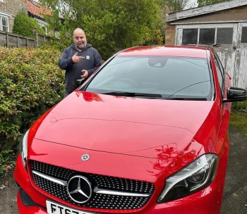 Martin receiving his new Mercedes in York