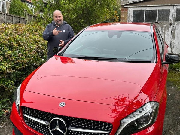 A very happy Martin receiving his new Mercedes in York