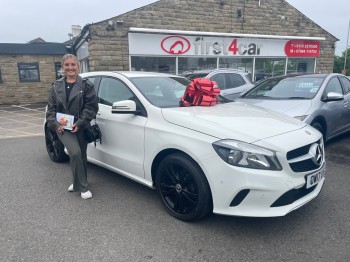 Connie collecting her new Mercedes