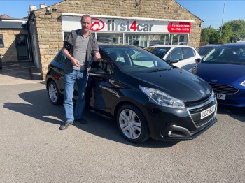 Paul collecting his new car