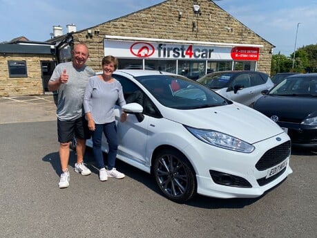 Marie and Graham collecting their new car