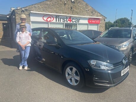 Dave and Suzy collecting their 2nd car from us 