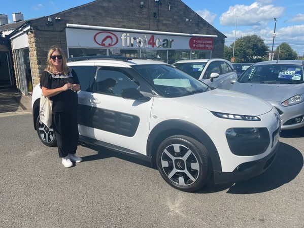 Helen from Pudsey collecting her new car after being recommend by her friends