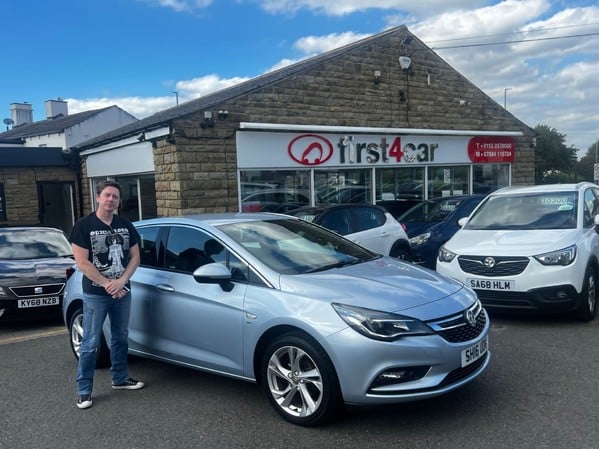 Phillip collecting his new astra