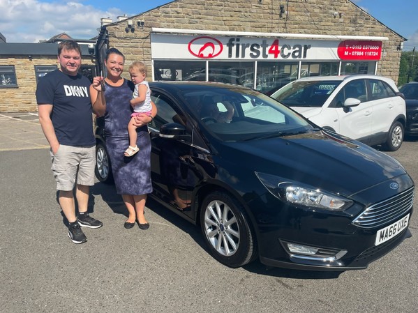 Julia and family from Bradford collecting their new car