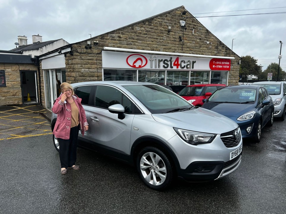 Tracy collecting her new car