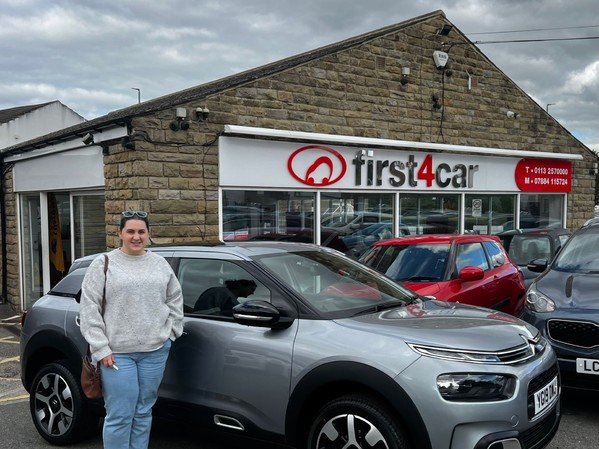 Rebecca from Leeds collecting her new car 