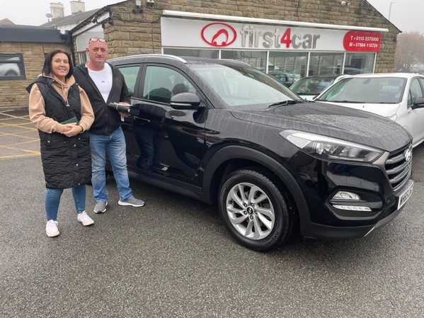 Darren and his wife from Durham collecting their new Tucson