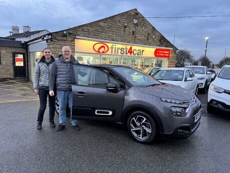 Paul and his partner from Leeds collecting their new car