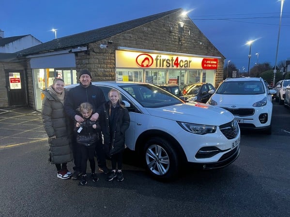 Steven and his family from Leeds collecting their new Grandland
