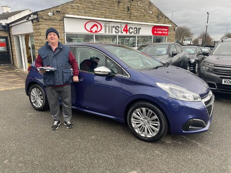 ian from Bradford collecting his new Peugeot