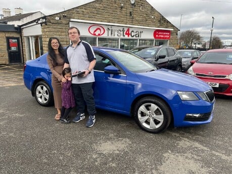 Callum and his family from Doncatser collecting their new Skoda