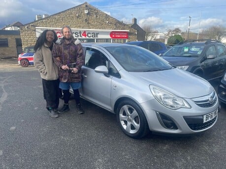 Michael and his partner collecting their new car after relocating from London to live in Pudsey