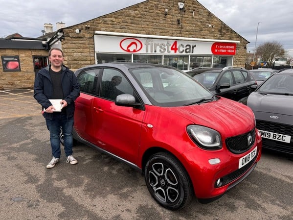 Neale from Leeds collecting his new Smart car