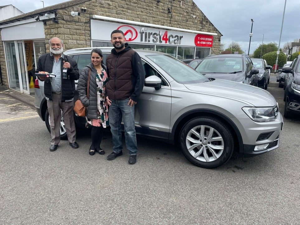 Ravinder and his family collecting their new Tiguan