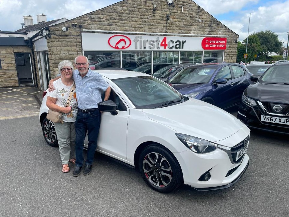 Derek and Julie from Leeds collecting their new Mazda 2.