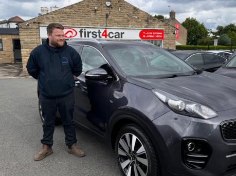 Adam collecting his new Kia Sportage.