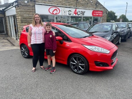 Sophie and her son collecting their new Fiesta from Calderdale.