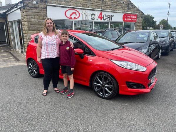 Sophie and her son collecting their new Fiesta from Calderdale.