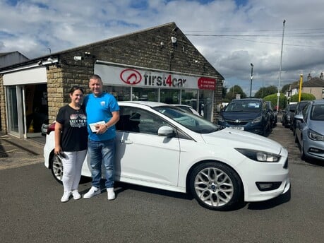 John and his wife from Edinburgh collecting their new Ford Focus.