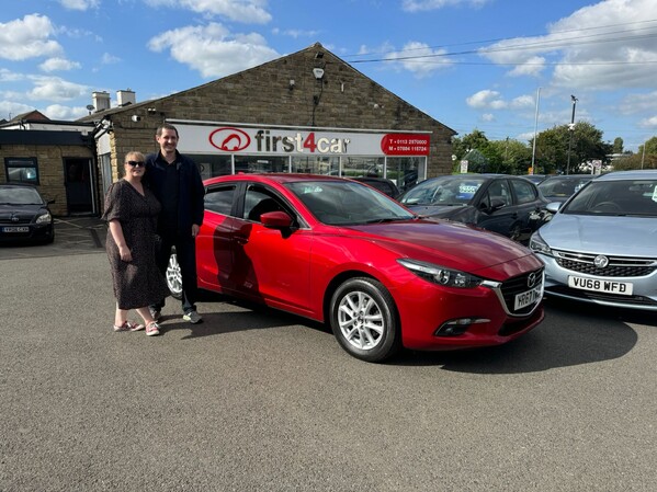 Daniel & Justine from Bradford collecting their new Mazda 3.