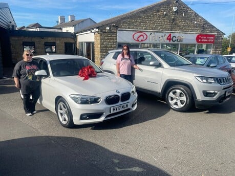 Best friends Cheryl and Georgina from Leeds collecting their new BMW and Jeep. 