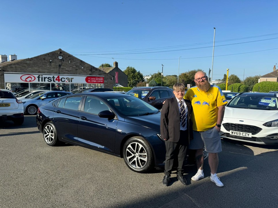 Gavin and his son from Leeds collecting their new Insignia