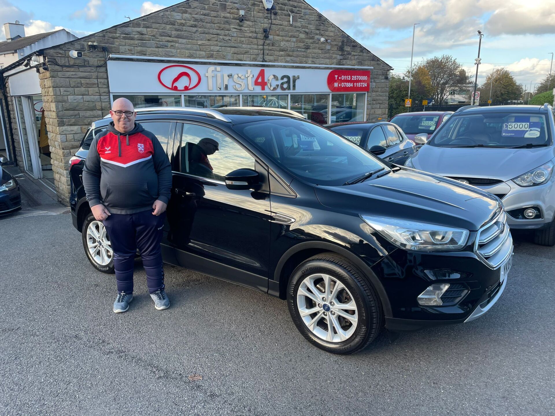 A very happy Jason from Bradford collecting his new Ford Kuga