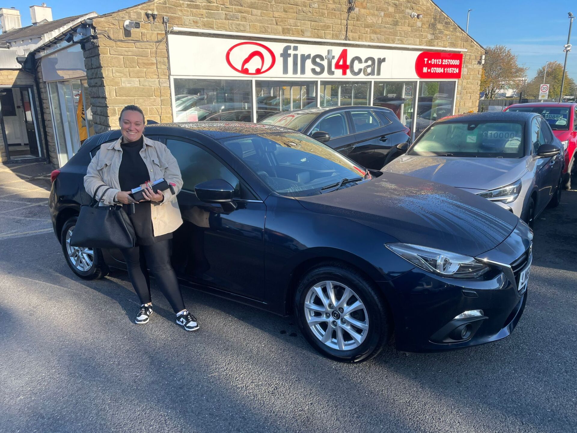 Zoe from Leeds collecting her new Mazda