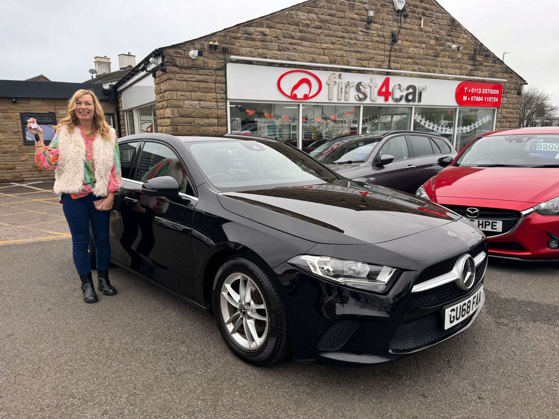 Angela from Bradford excited to collect her first automatic car from us a beautiful Mercedes.