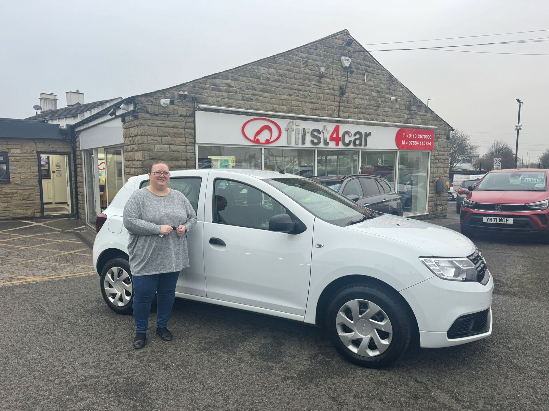 Amanda from Leeds collecting her new Dacia.