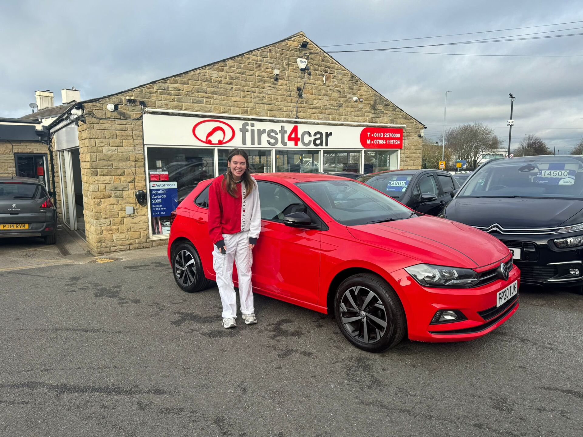 Kate from Gainsborough collecting her new red Polo with matching outfit for the occasion.