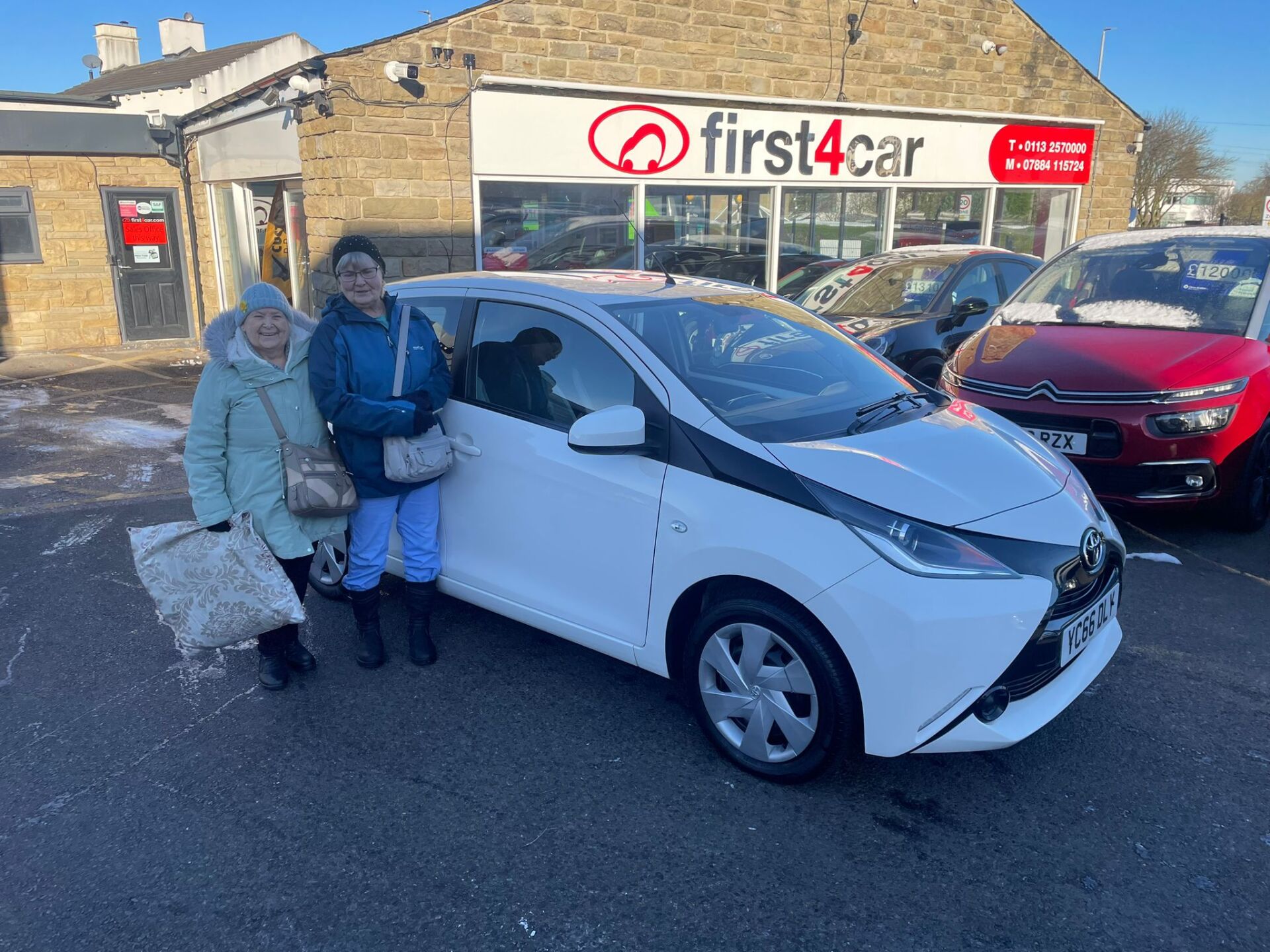 Marie and her friend collecting her new Toyota Aygo.