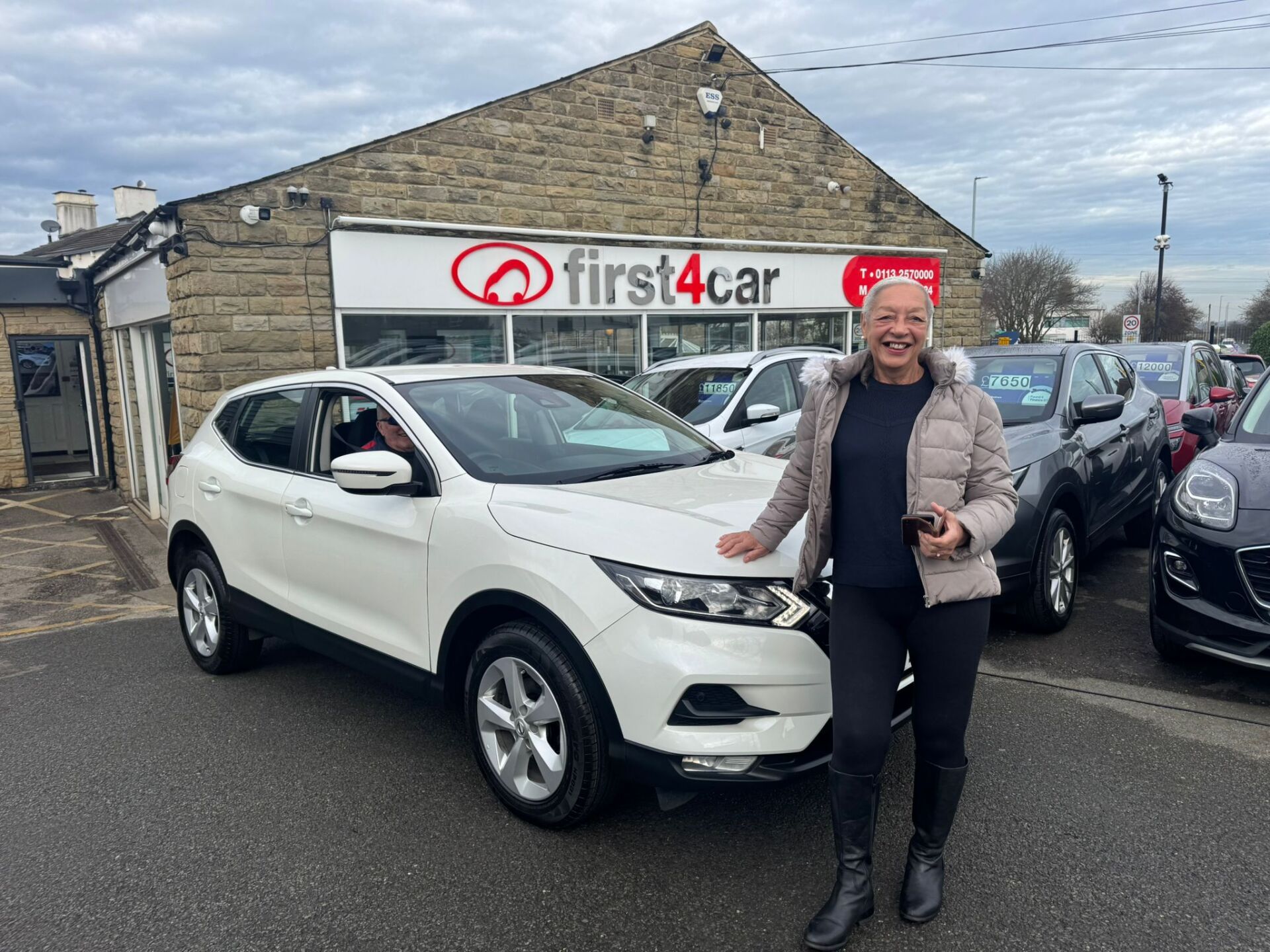 Denise and her husband Joe from Leeds, West Yorkshire collecting their new Nissan Qashqai.