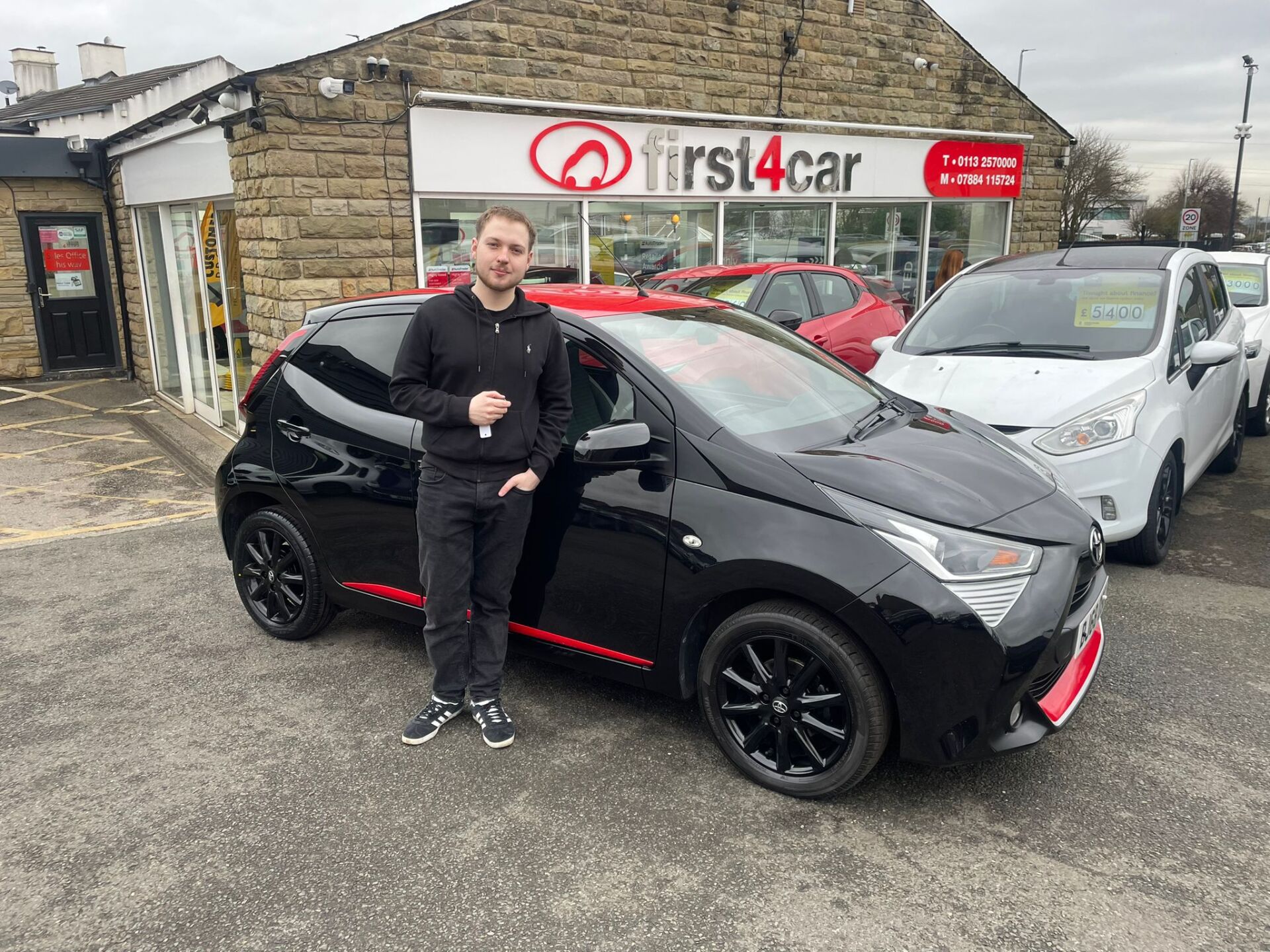 Josh from Leeds collecting his very first car a Toyota Aygo.