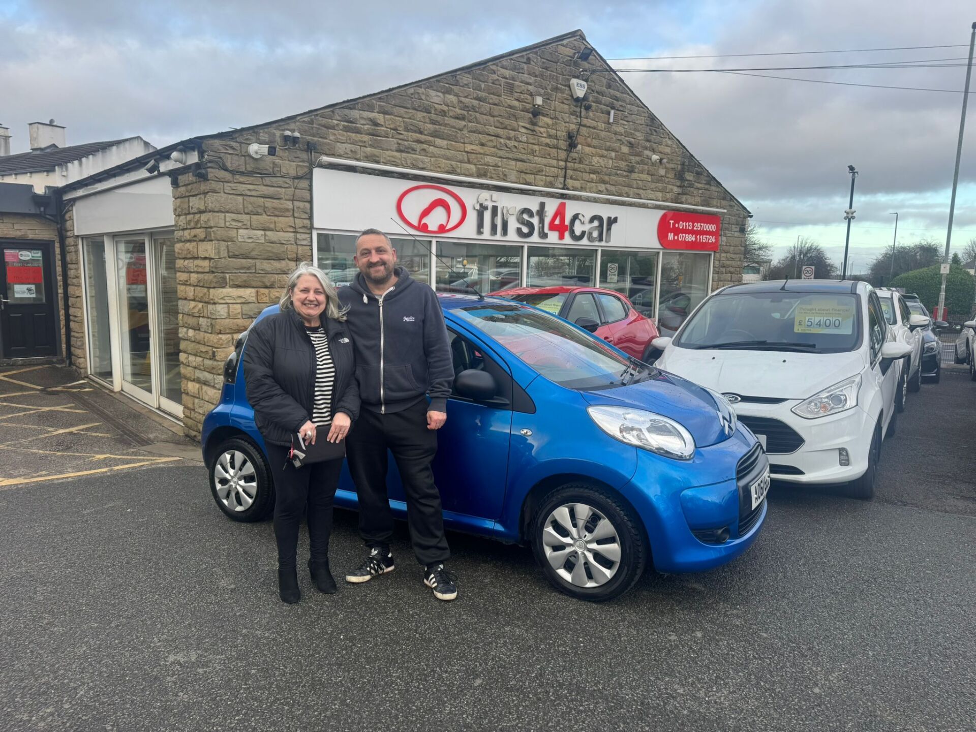 Sharon and Steve from Drighlington collecting their sons first car a Citroën C1.