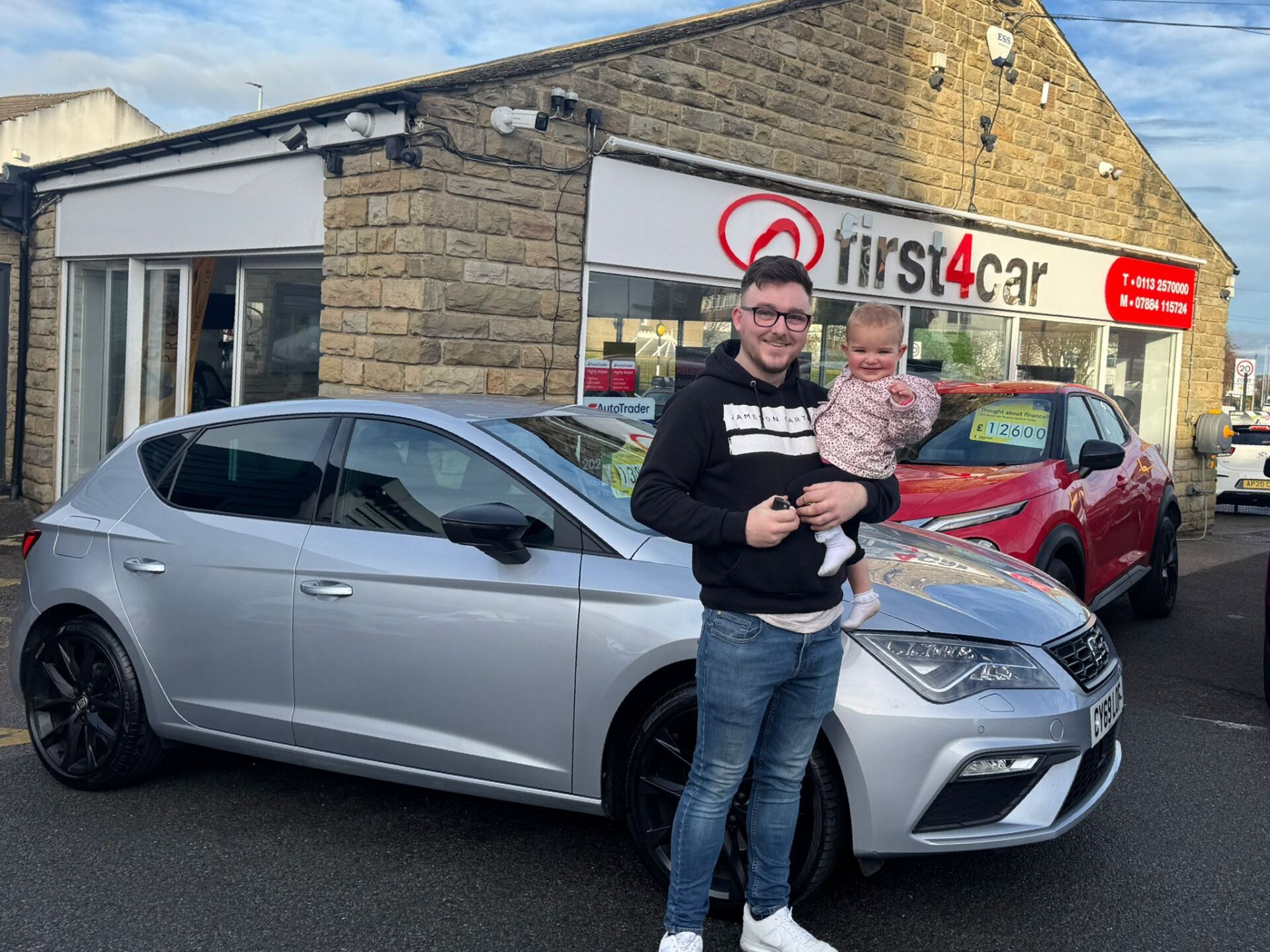 Sam and his daughter from Hull collecting their new Seat Leon.