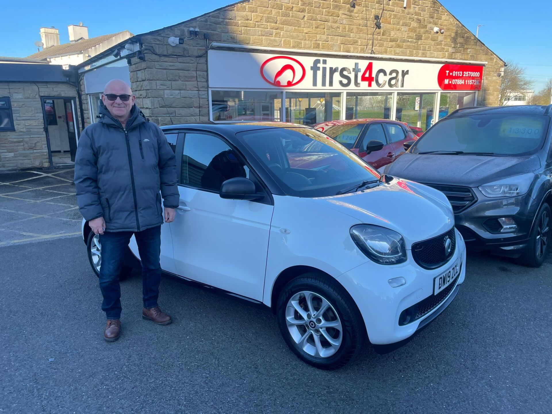 Darren from Halifax collecting his new Smart car.