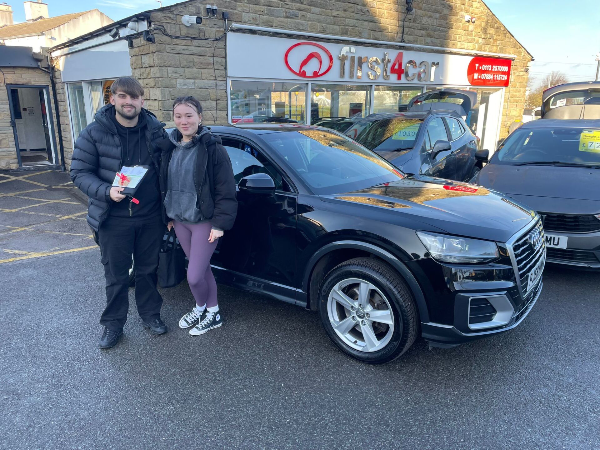 Dion and Katie from Cumbria using our Click and Collect service for their new Audi Q2