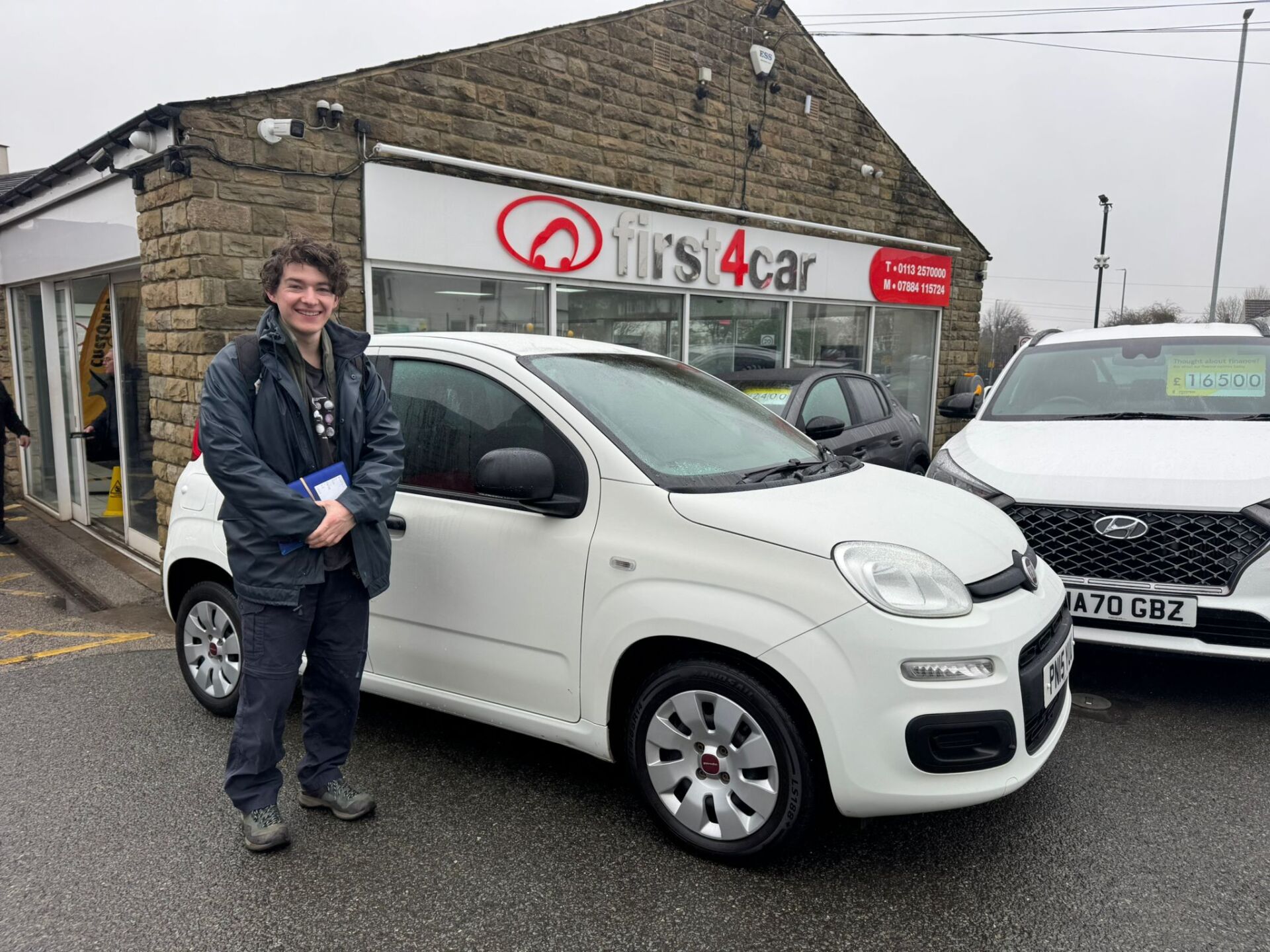 Nick from Gwynedd collecting his first car a Fiat Panda.