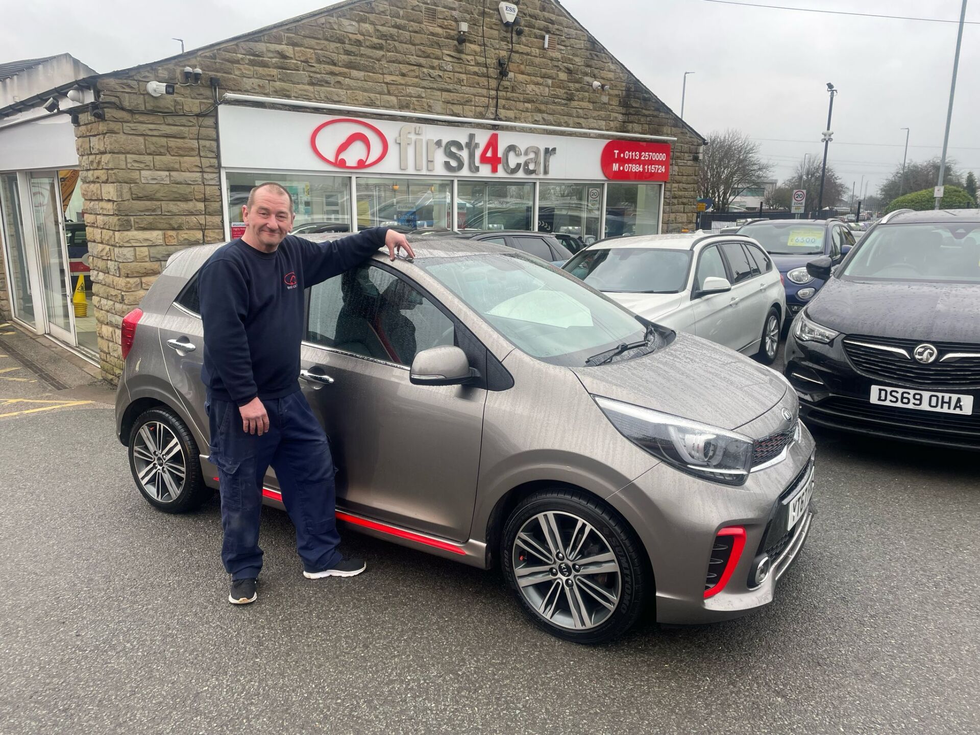 Dave from Leeds buying his 6th car from us a lovely Kia Picanto.