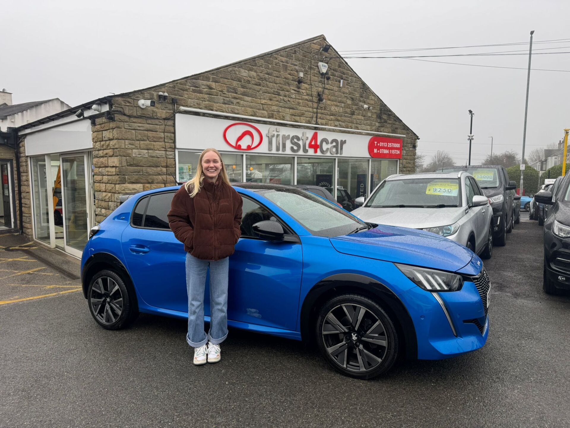 Maisie from Halifax collecting her new Peugeot 208 GT Line